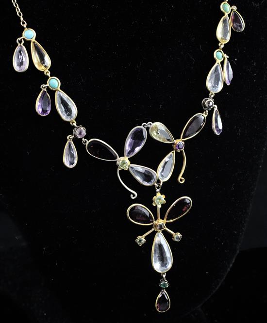 An early to mid 20th century gold and silver multi gem set drop necklace, 20in.